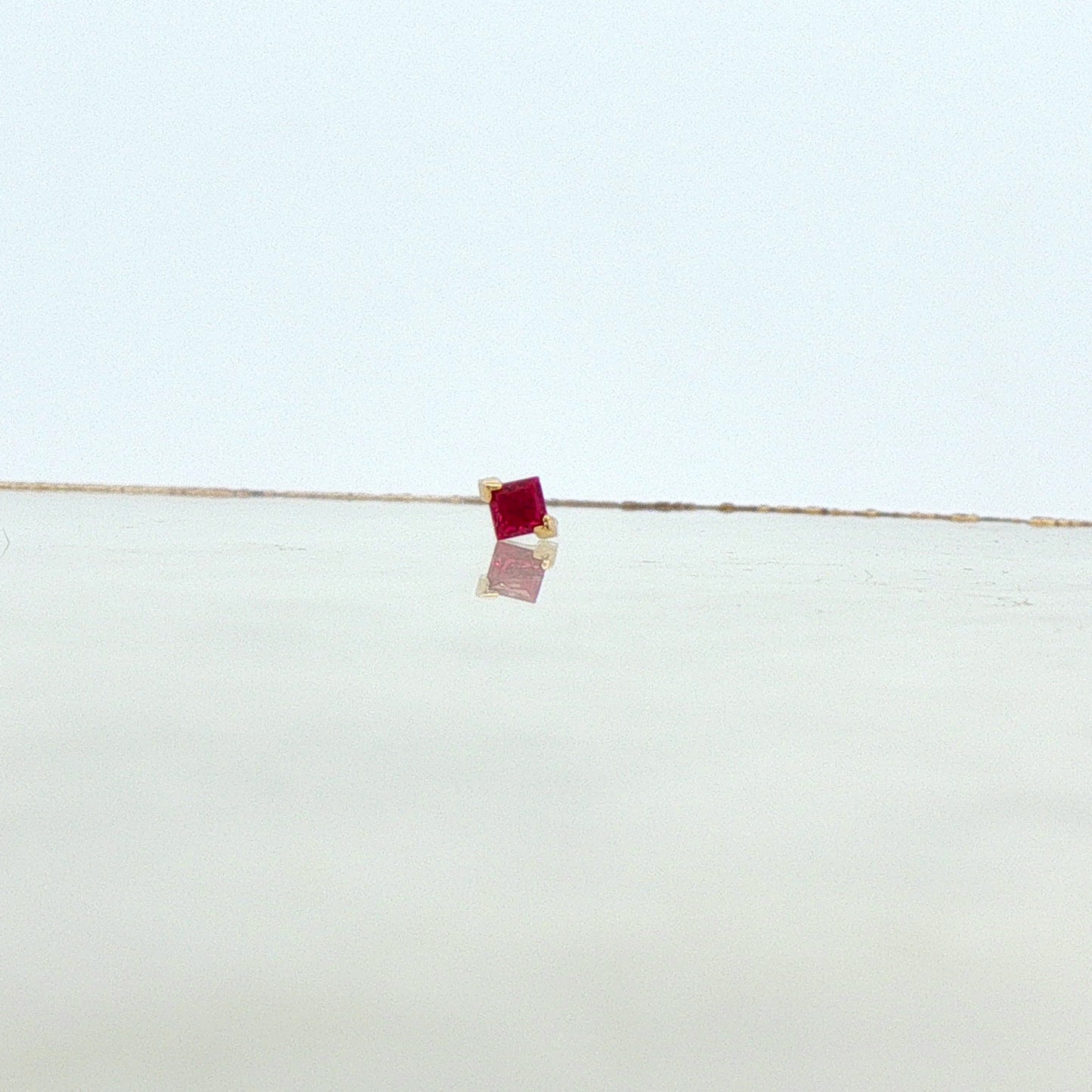 Gold V-Prong Princess Cut Gem